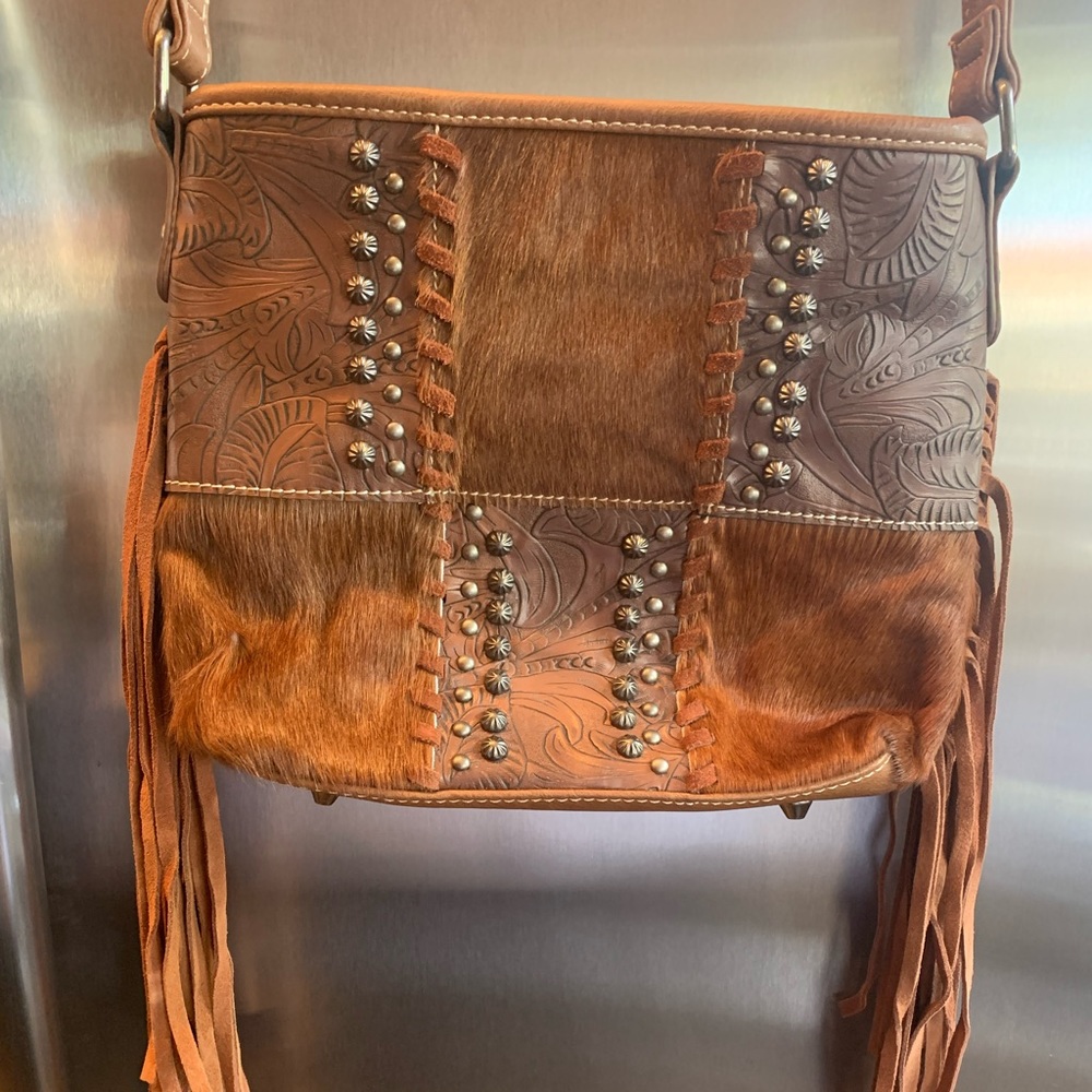 Montana West conceal to carry bag! Worn once, it’s in perfect condition.
